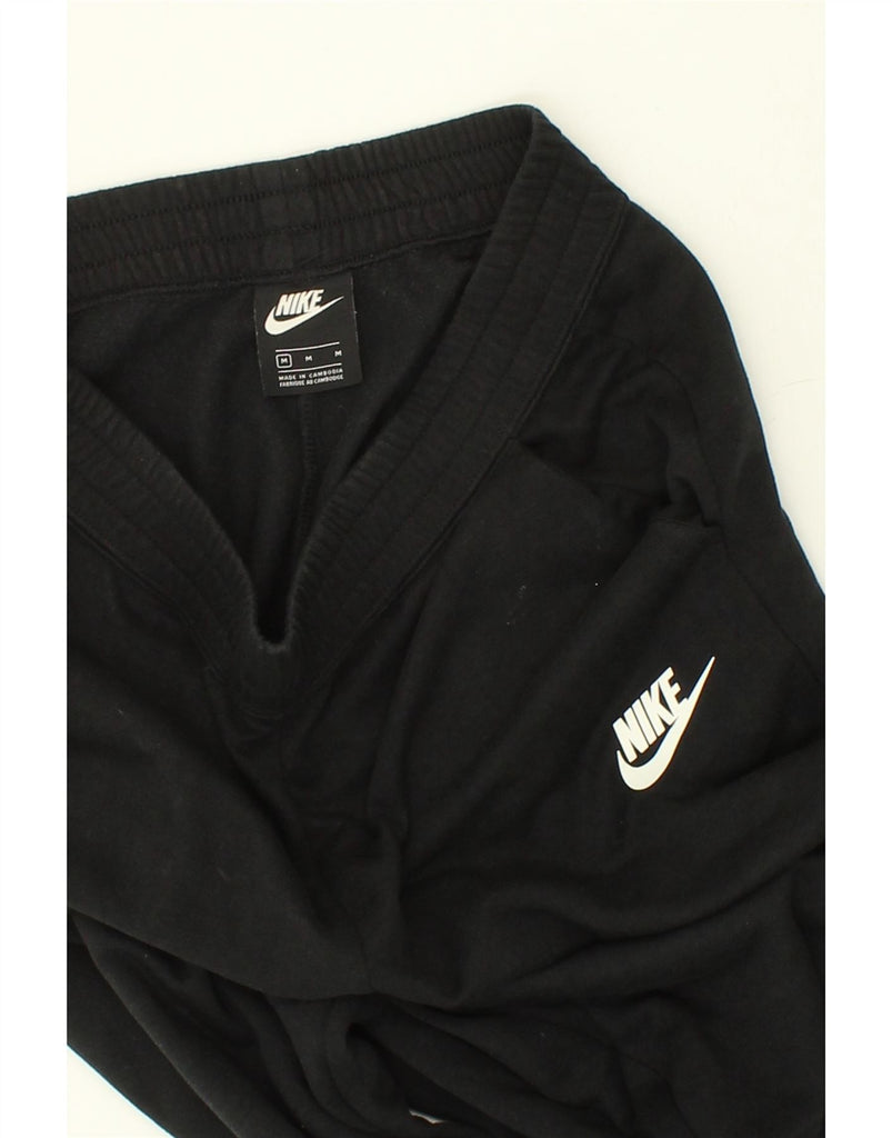 NIKE Womens Graphic Tracksuit Trousers Joggers UK 14 Medium Black Cotton | Vintage Nike | Thrift | Second-Hand Nike | Used Clothing | Messina Hembry 