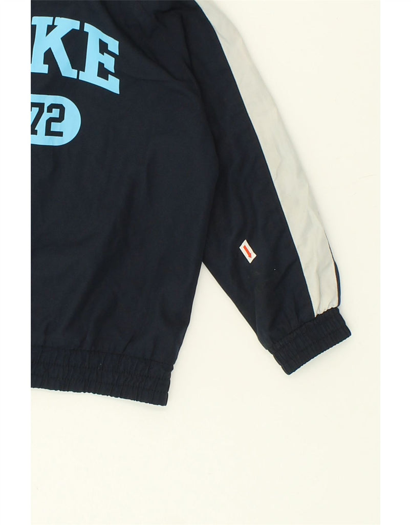 NIKE Boys Graphic Tracksuit Top Jacket 4-5 Years Small Navy Blue Vintage Nike and Second-Hand Nike from Messina Hembry 