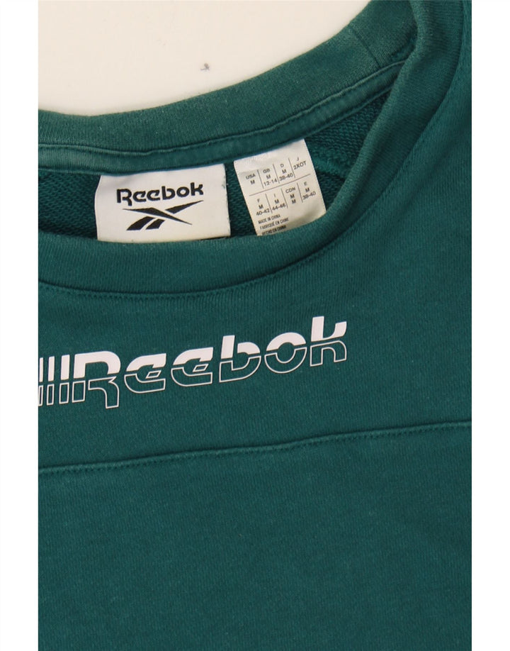 REEBOK Womens Graphic Sweatshirt Jumper UK 12/14 Medium Green Colourblock Vintage Reebok and Second-Hand Reebok from Messina Hembry 