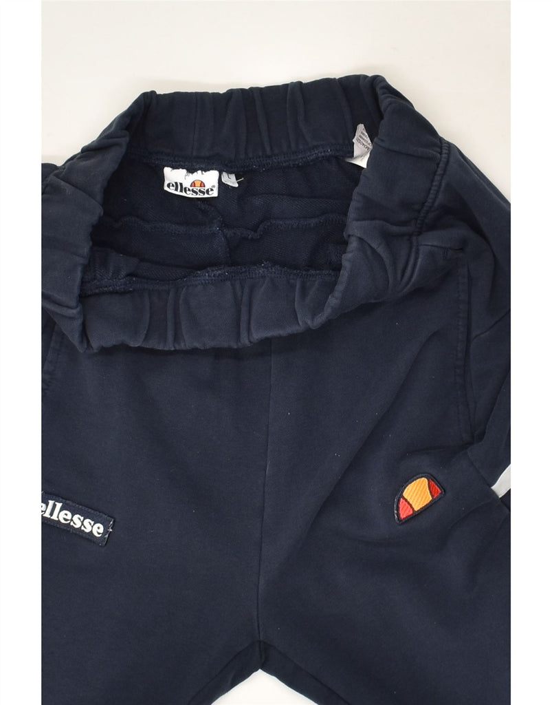 ELLESSE Womens Graphic Tracksuit Trousers Joggers UK 14 Large Navy Blue | Vintage Ellesse | Thrift | Second-Hand Ellesse | Used Clothing | Messina Hembry 