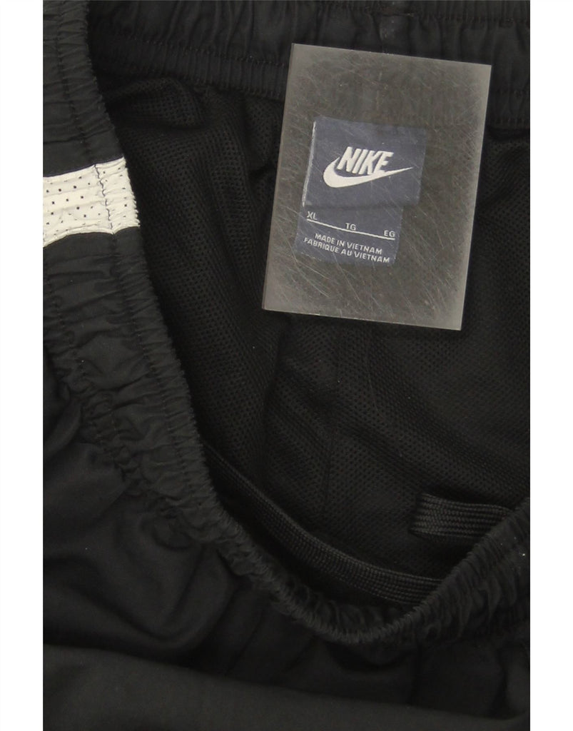 NIKE Mens Tracksuit Trousers XL Black Colourblock Vintage Nike and Second-Hand Nike from Messina Hembry 