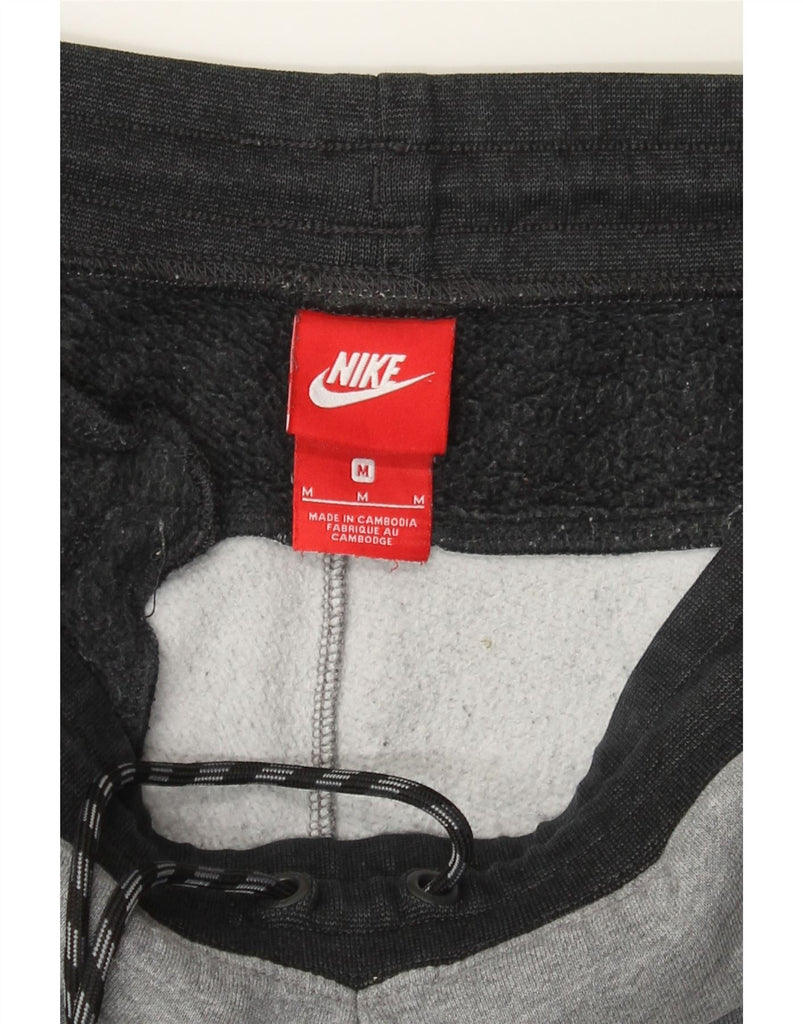 NIKE Mens Tracksuit Trousers Joggers Medium  Grey Colourblock Cotton Vintage Nike and Second-Hand Nike from Messina Hembry 