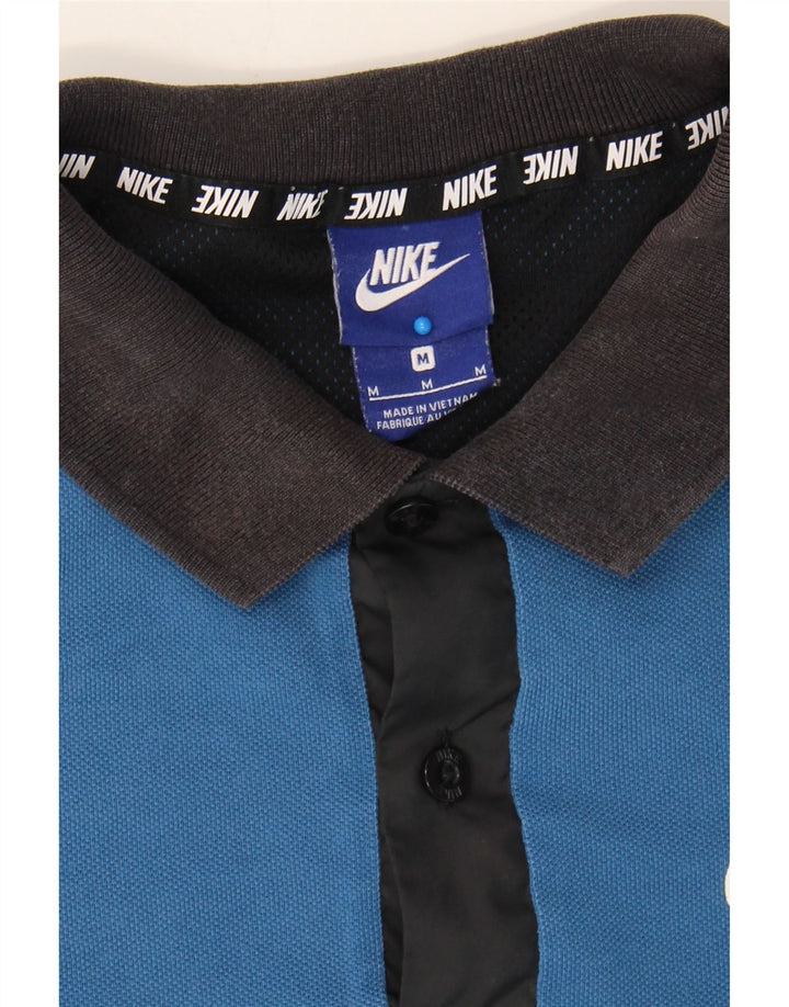 NIKE Mens Polo Shirt Medium Blue Cotton Sports Vintage Nike and Second-Hand Nike from Messina Hembry 