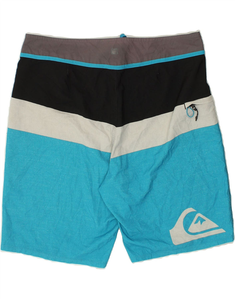 QUIKSILVER Mens Swimming Shorts Large Blue Colourblock Polyester | Vintage Quiksilver | Thrift | Second-Hand Quiksilver | Used Clothing | Messina Hembry 