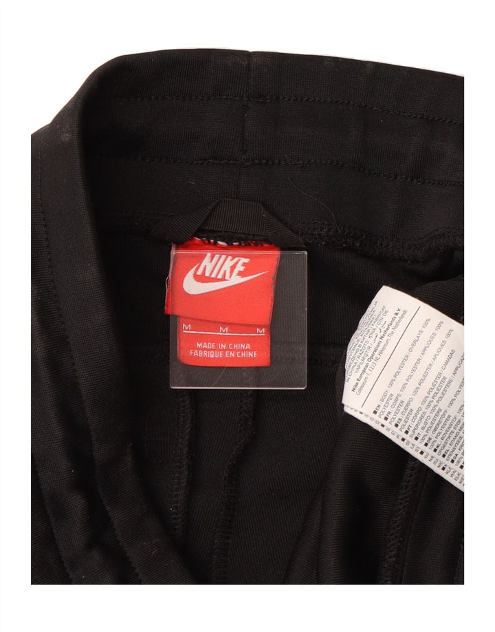 NIKE Womens Tracksuit Trousers Joggers UK 12 Medium  Black Polyester Vintage Nike and Second-Hand Nike from Messina Hembry 