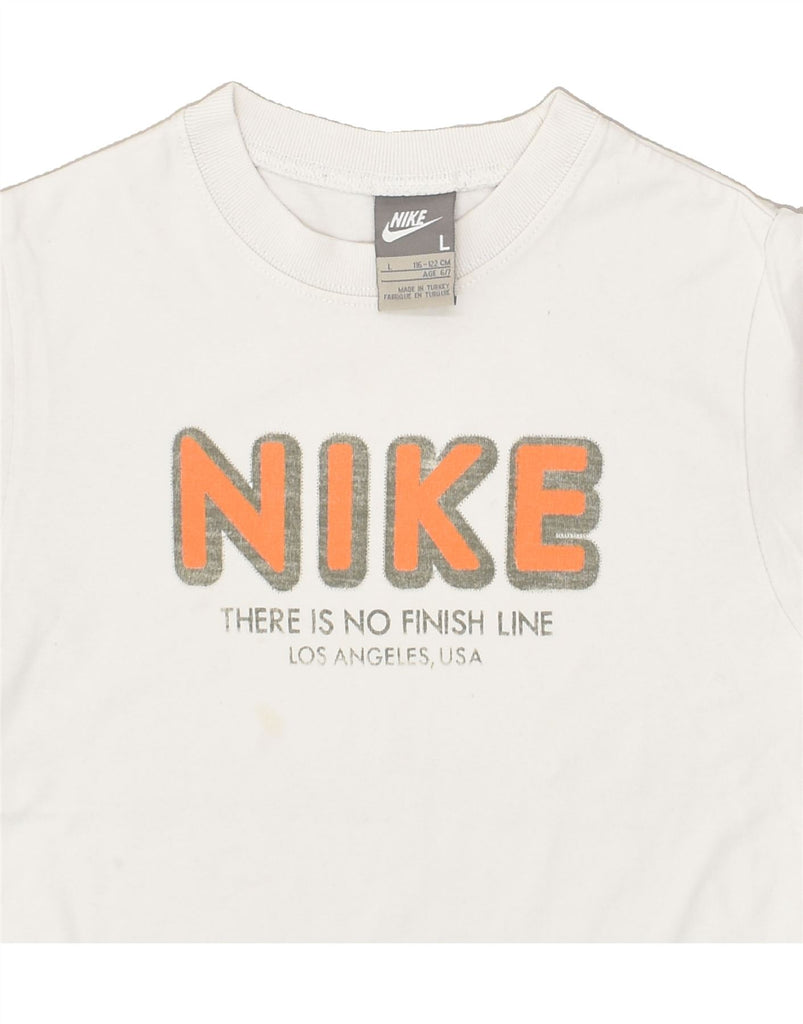 NIKE Boys Graphic T-Shirt Top 6-7 Years White Cotton | Vintage Nike | Thrift | Second-Hand Nike | Used Clothing | Messina Hembry 