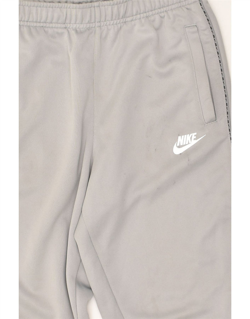 NIKE Boys Tracksuit Trousers Joggers 12-13 Years Large Grey Polyester | Vintage Nike | Thrift | Second-Hand Nike | Used Clothing | Messina Hembry 