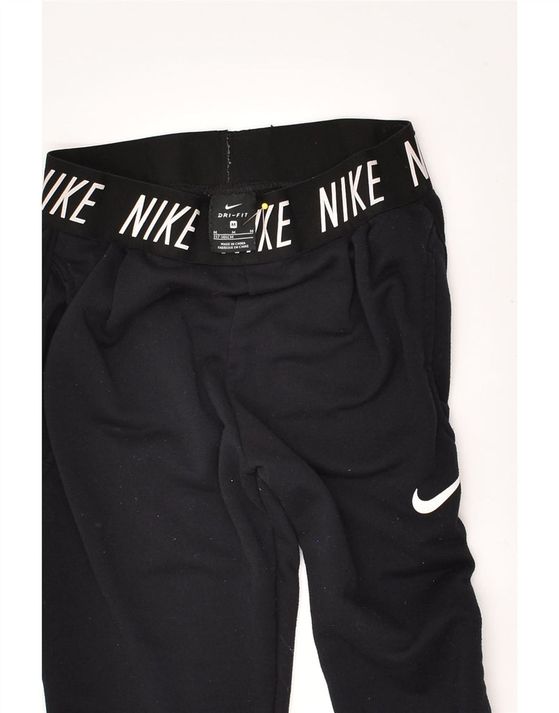 NIKE Girls Graphic Tracksuit Trousers Joggers 10-11 Years Medium Black | Vintage Nike | Thrift | Second-Hand Nike | Used Clothing | Messina Hembry 