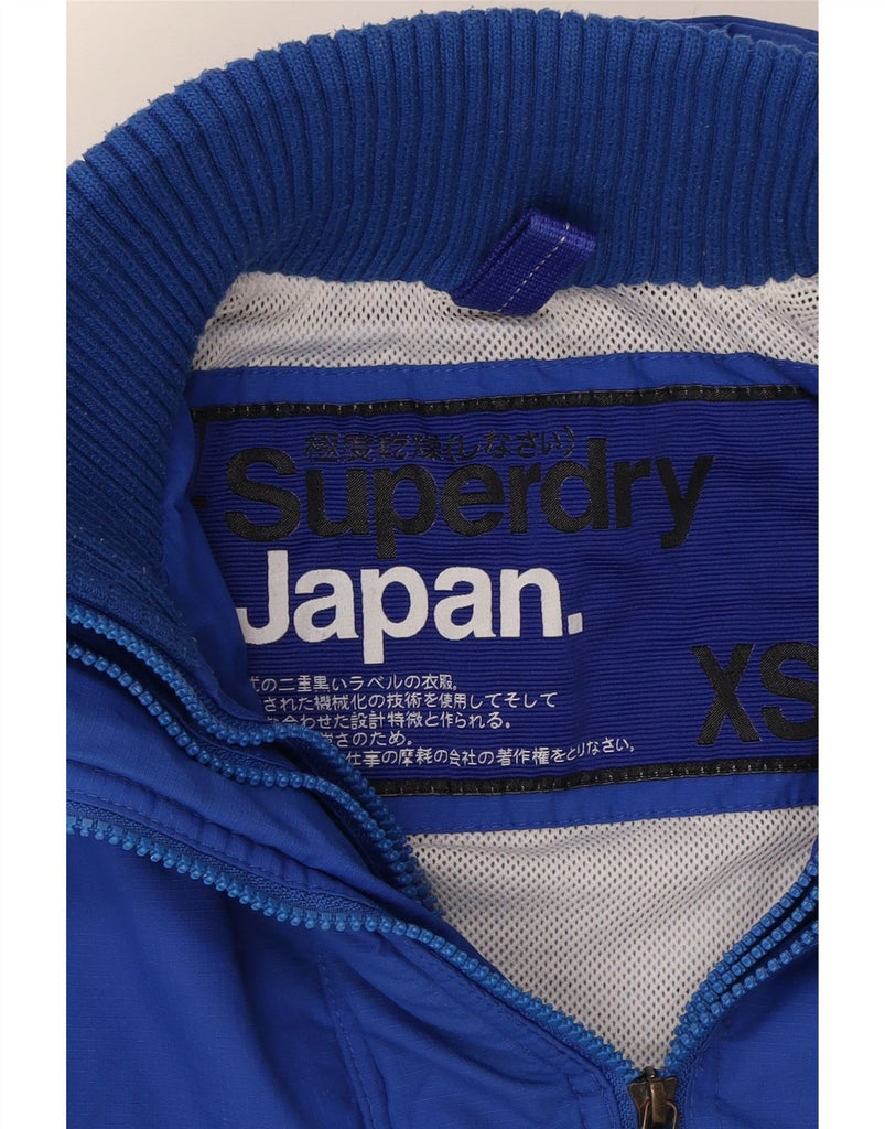 SUPERDRY Womens Graphic Rain Jacket UK 6 XS Blue Nylon Vintage Superdry and Second-Hand Superdry from Messina Hembry 