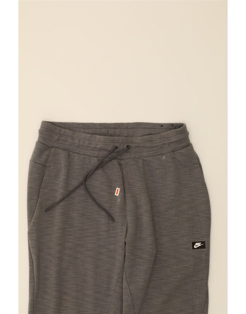 NIKE Mens Tracksuit Trousers Joggers Medium Grey Cotton Vintage Nike and Second-Hand Nike from Messina Hembry 