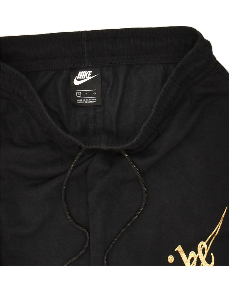 NIKE Womens Graphic Tracksuit Trousers Joggers UK 10 Small Black Polyester | Vintage Nike | Thrift | Second-Hand Nike | Used Clothing | Messina Hembry 