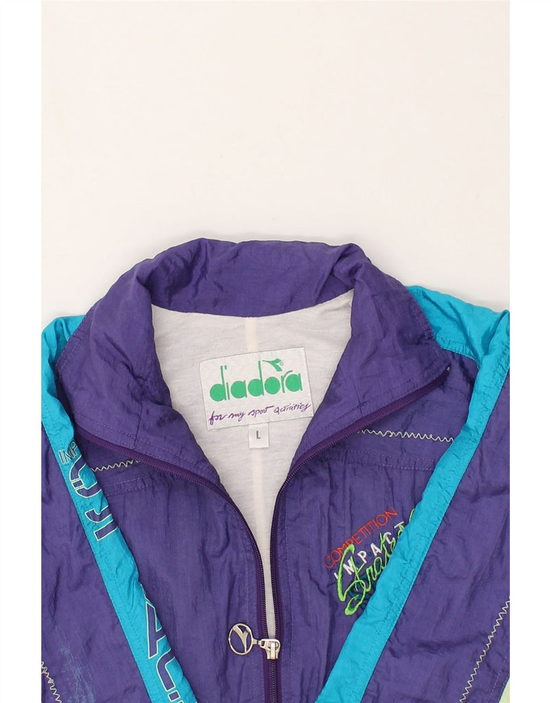 DIADORA Womens Graphic Tracksuit Top Jacket UK 16 Large Purple Colourblock | Vintage Diadora | Thrift | Second-Hand Diadora | Used Clothing | Messina Hembry 