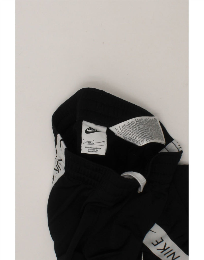 NIKE Boys Tracksuit Trousers Joggers 8-9 Years Small Black Colourblock Vintage Nike and Second-Hand Nike from Messina Hembry 