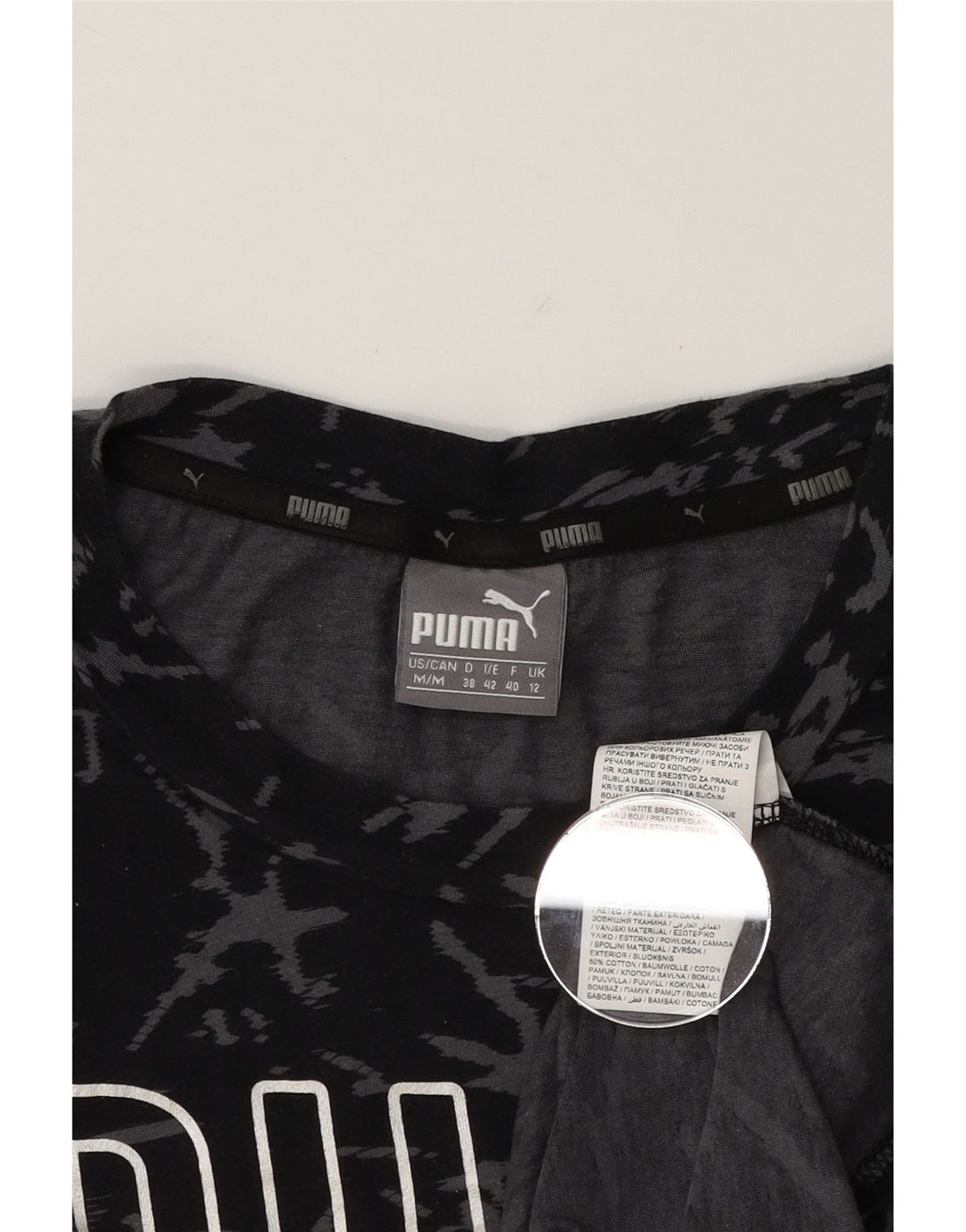 PUMA Womens Abstract Pattern Graphic T-Shirt Top UK 12 Medium  Black Vintage Puma and Second-Hand Puma from Messina Hembry 