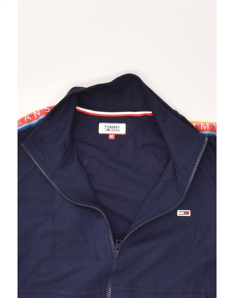 TOMMY HILFIGER Womens Graphic Tracksuit Top Jacket UK 14 Medium Navy Blue | Vintage Tommy Hilfiger | Thrift | Second-Hand Tommy Hilfiger | Used Clothing | Messina Hembry 