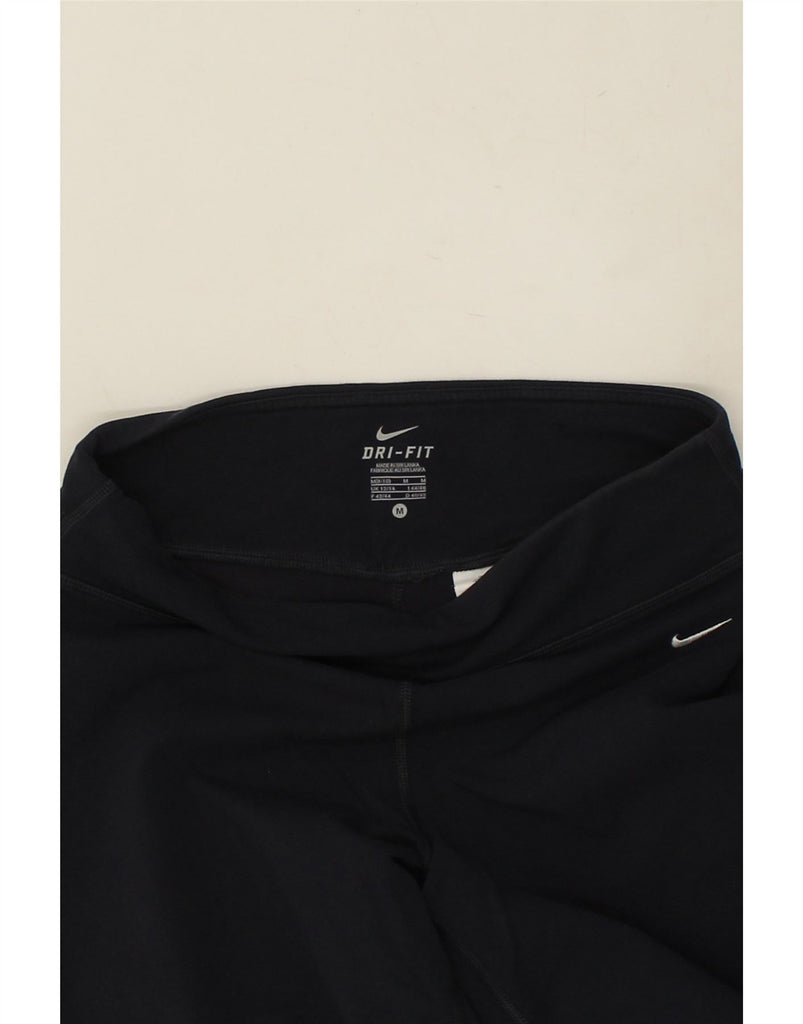 NIKE Womens Dri Fit Graphic Tracksuit Trousers UK 12 Medium Navy Blue Vintage Nike and Second-Hand Nike from Messina Hembry 