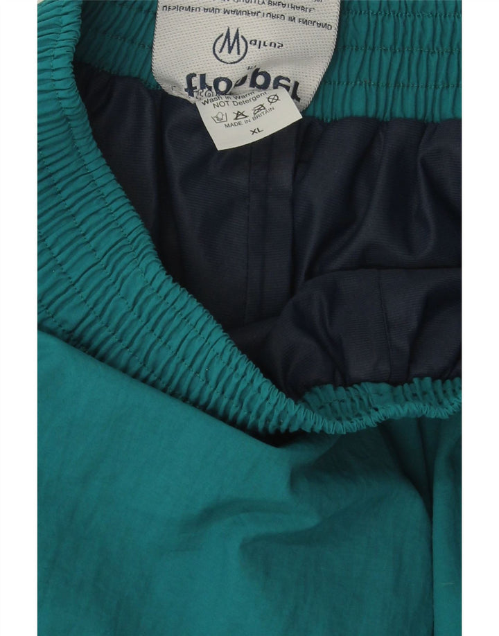 VINTAGE Mens Tracksuit Trousers XL  Turquoise Nylon Vintage Vintage and Second-Hand Vintage from Messina Hembry 