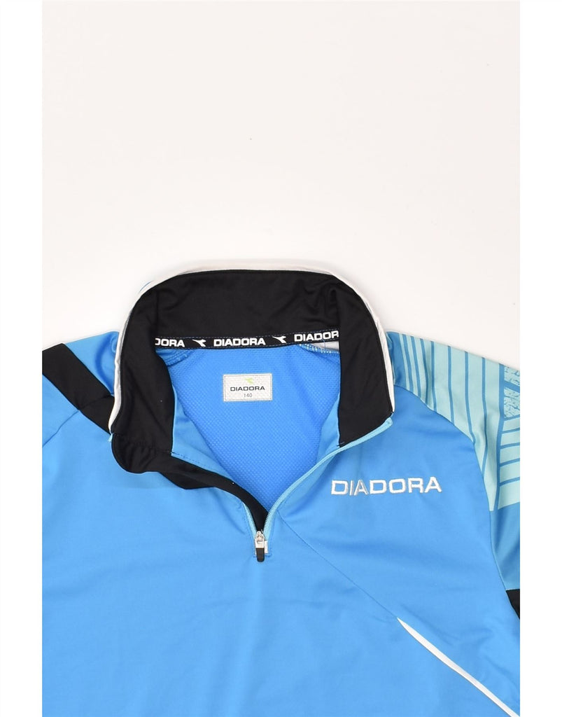 DIADORA Boys Graphic Short Sleeve Pullover Tracksuit Top 9-10 Years Blue | Vintage Diadora | Thrift | Second-Hand Diadora | Used Clothing | Messina Hembry 