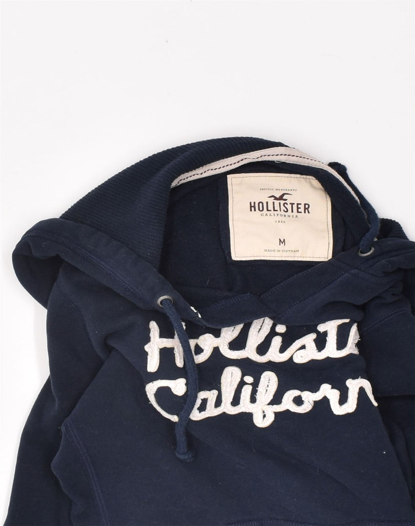 HOLLISTER Womens Graphic Hoodie Jumper UK 12 Medium Navy Blue Cotton | Vintage | Thrift | Second-Hand | Used Clothing | Messina Hembry 