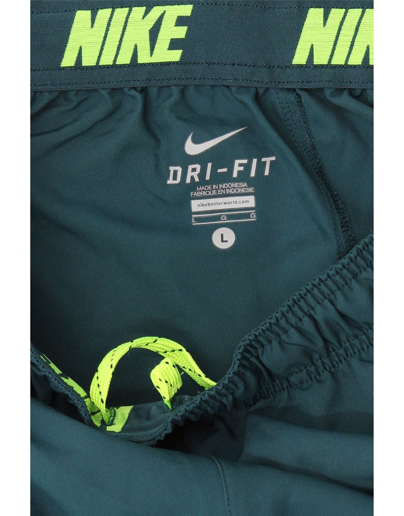 NIKE Womens Dri Fit Tracksuit Trousers Joggers UK 14 Large Green Polyester Vintage Nike and Second-Hand Nike from Messina Hembry 