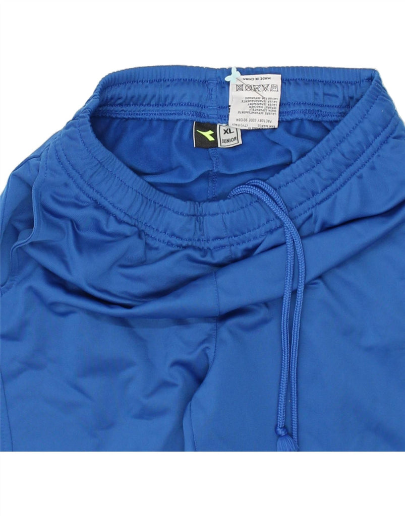 DIADORA Boys Tracksuit Trousers 8-9 Years XL Blue Polyester | Vintage Diadora | Thrift | Second-Hand Diadora | Used Clothing | Messina Hembry 