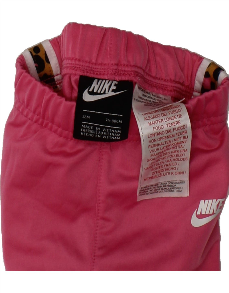 NIKE Baby Girls Joggers Tracksuit Trousers 9-12 Months  Pink Colourblock Vintage Nike and Second-Hand Nike from Messina Hembry 