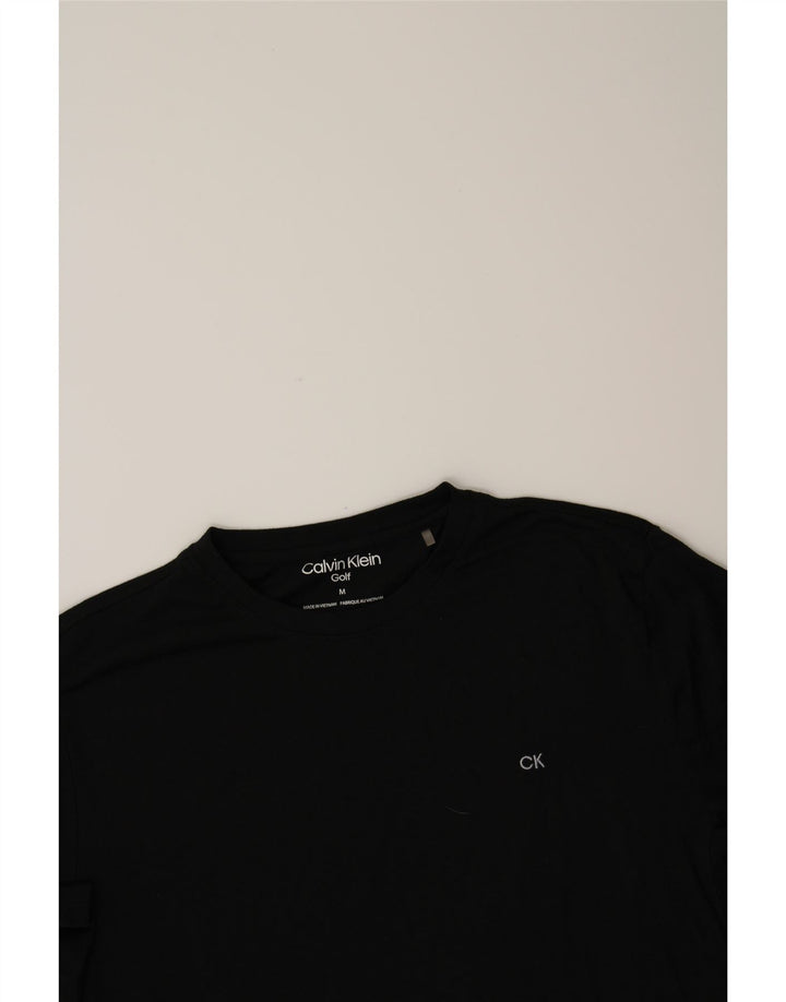 CALVIN KLEIN Mens Golf T-Shirt Top Medium Black Polyester Vintage Calvin Klein and Second-Hand Calvin Klein from Messina Hembry 
