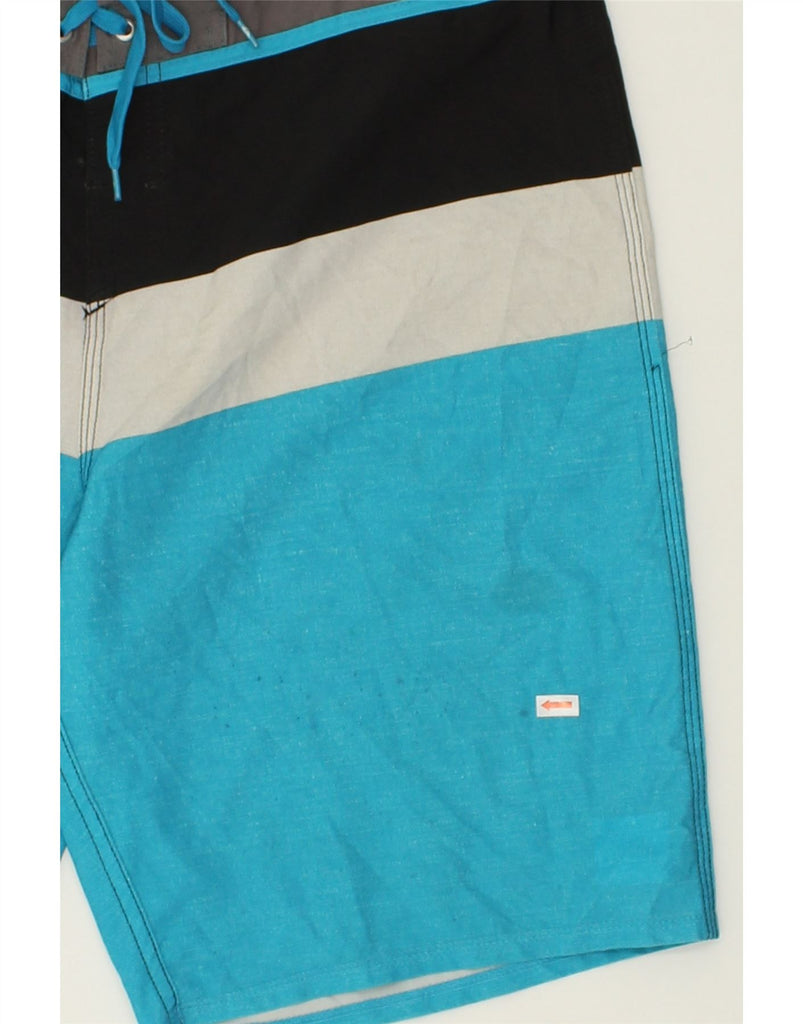 QUIKSILVER Mens Swimming Shorts Large Blue Colourblock Polyester | Vintage Quiksilver | Thrift | Second-Hand Quiksilver | Used Clothing | Messina Hembry 