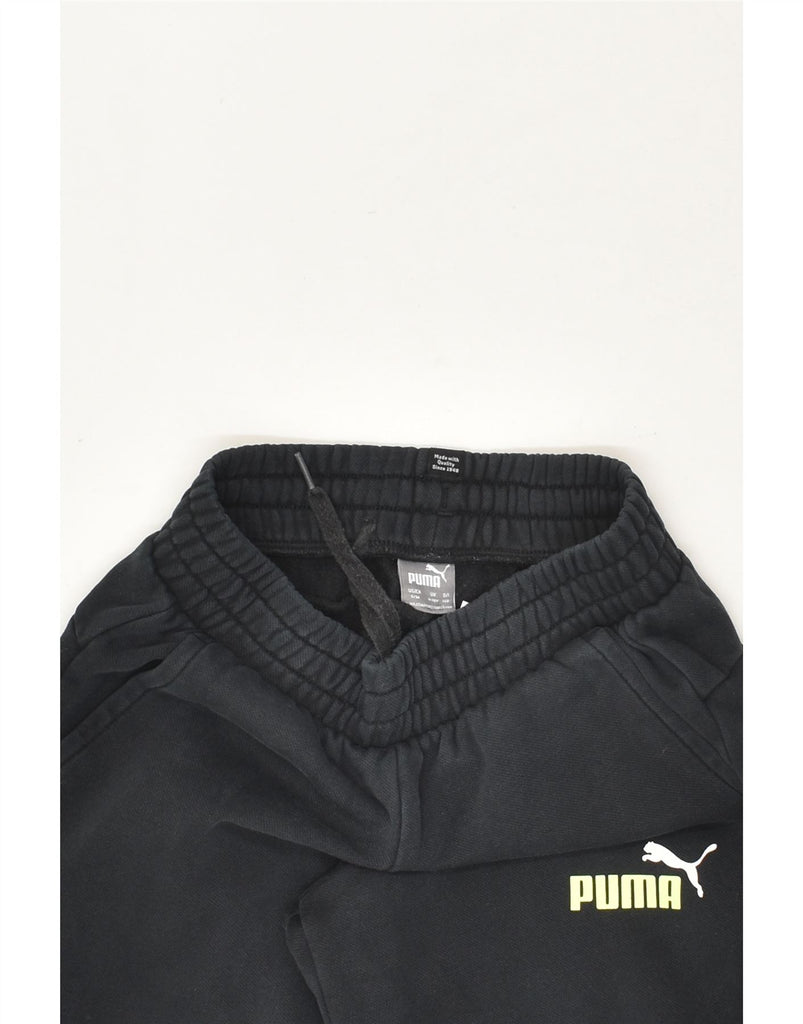 PUMA Boys Graphic Tracksuit Trousers Joggers 9-10 Years Black Cotton | Vintage Puma | Thrift | Second-Hand Puma | Used Clothing | Messina Hembry 