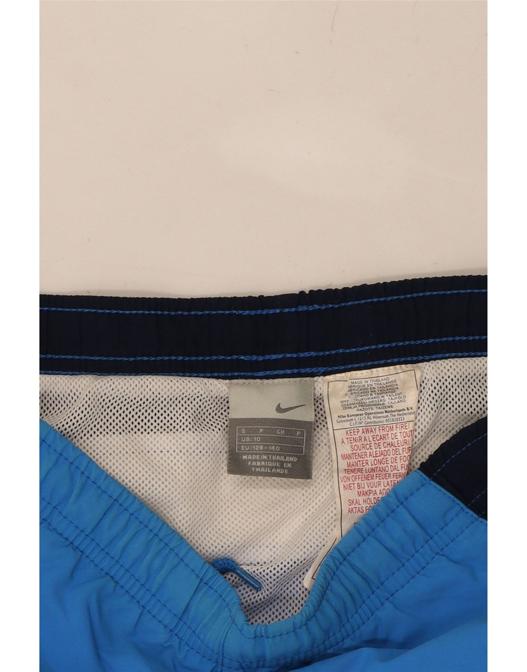 NIKE Boys Sport Shorts 8-9 Years Small Blue Colourblock Nylon Vintage Nike and Second-Hand Nike from Messina Hembry 