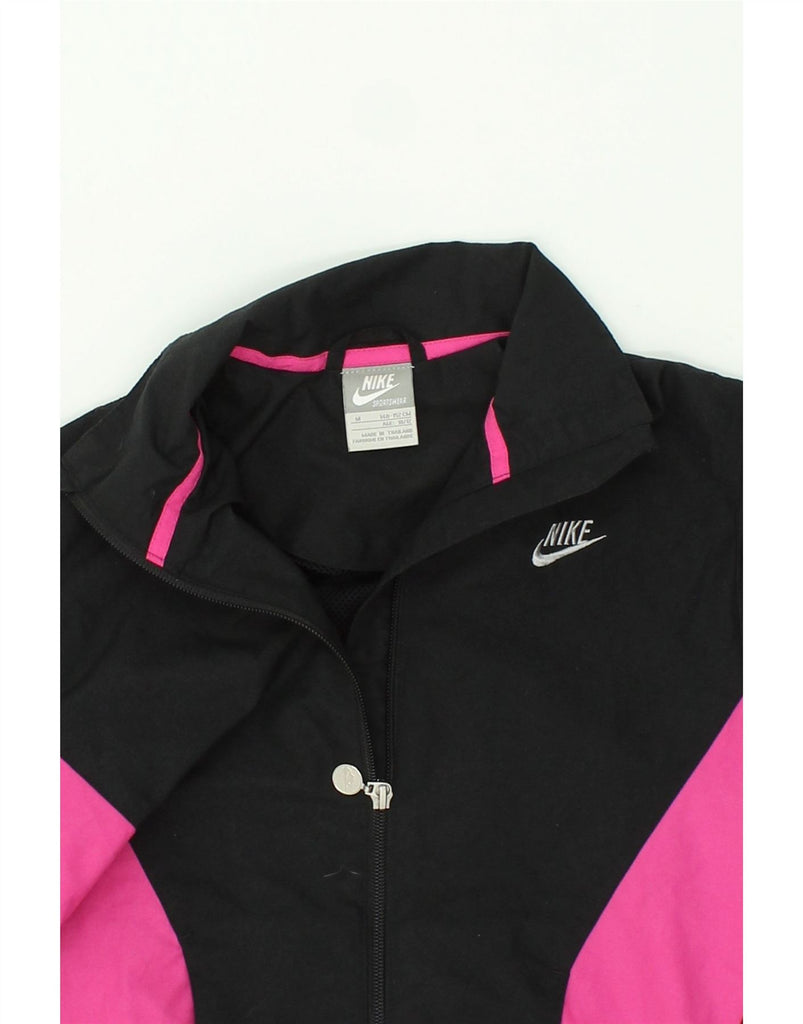 NIKE Girls Tracksuit Top Jacket 10-11 Years Medium  Black Colourblock Vintage Nike and Second-Hand Nike from Messina Hembry 