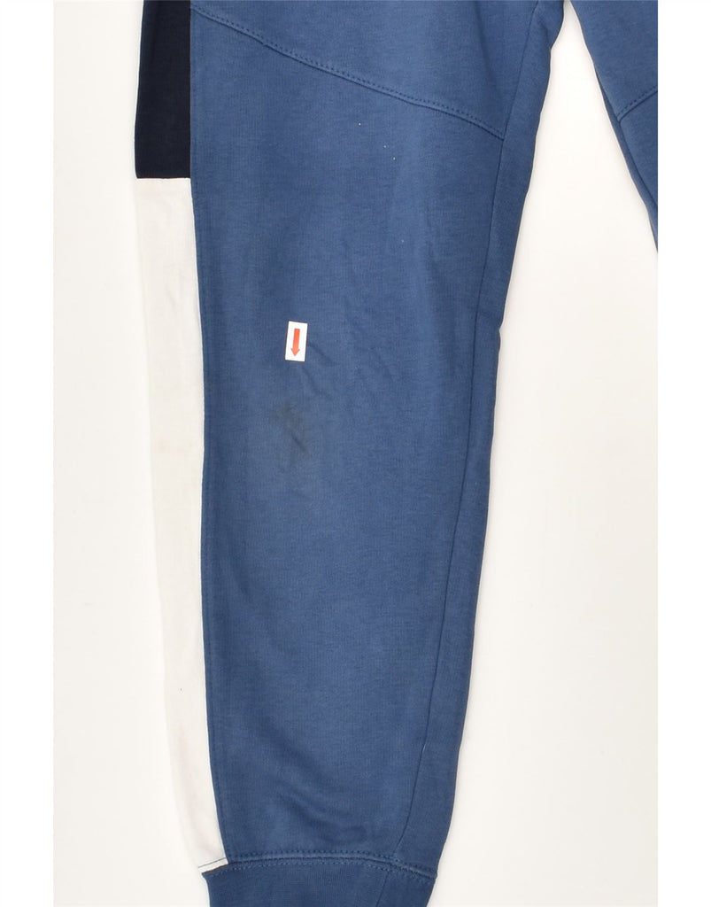 NIKE Boys Tracksuit Trousers Joggers 10-11 Years Medium Blue Colourblock | Vintage Nike | Thrift | Second-Hand Nike | Used Clothing | Messina Hembry 