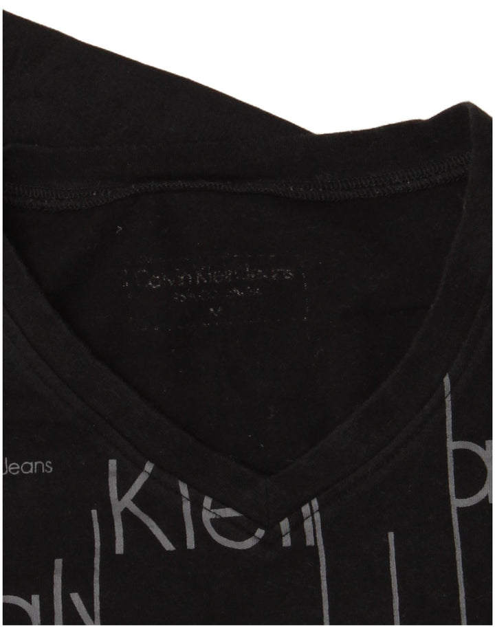 Calvin Klein Jeans Womens Graphic Top Long Sleeve UK 12 Medium Black