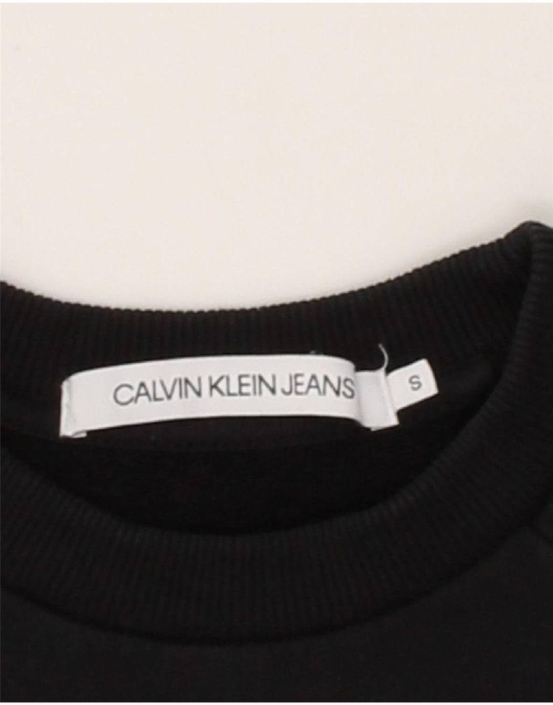 CALVIN KLEIN Womens Oversized Graphic Sweatshirt Jumper UK 10 Small Black Vintage Calvin Klein and Second-Hand Calvin Klein from Messina Hembry 