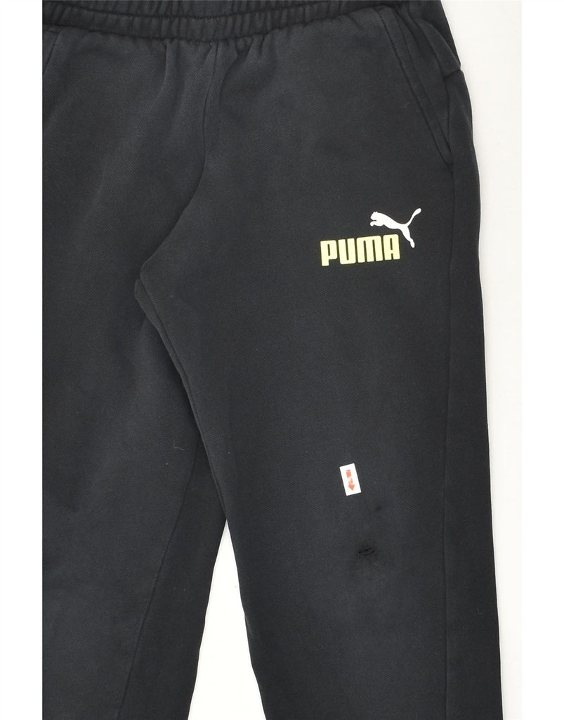 PUMA Boys Graphic Tracksuit Trousers Joggers 9-10 Years Black Cotton | Vintage Puma | Thrift | Second-Hand Puma | Used Clothing | Messina Hembry 