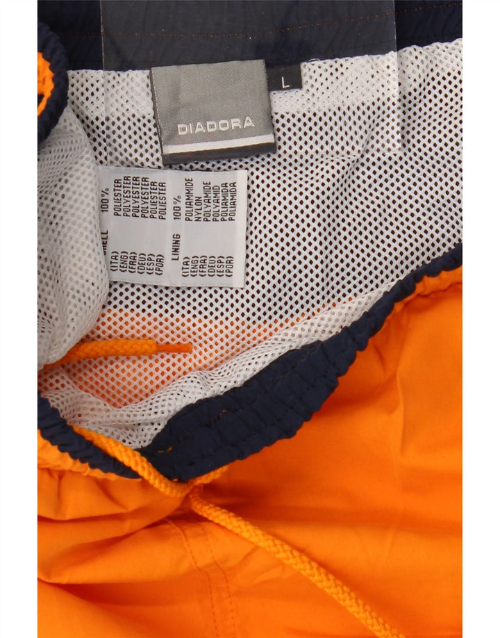 DIADORA Mens Graphic Sport Shorts Large  Orange Colourblock Polyester Vintage Diadora and Second-Hand Diadora from Messina Hembry 