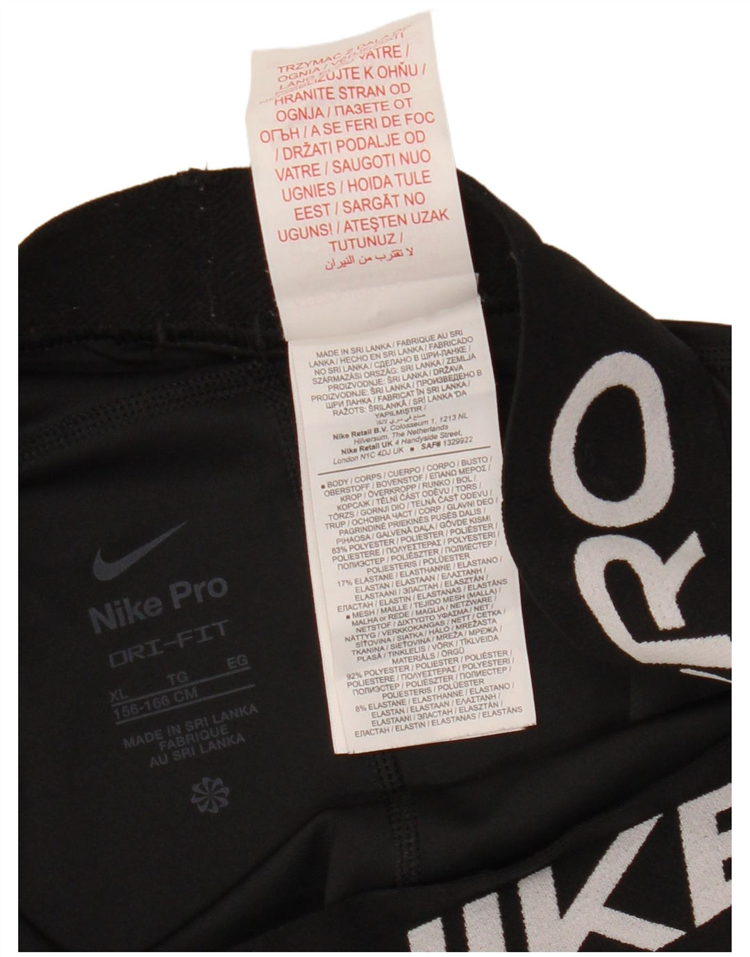 NIKE Girls Dri Fit Graphic Leggings 13-14 Years XL Black Polyester