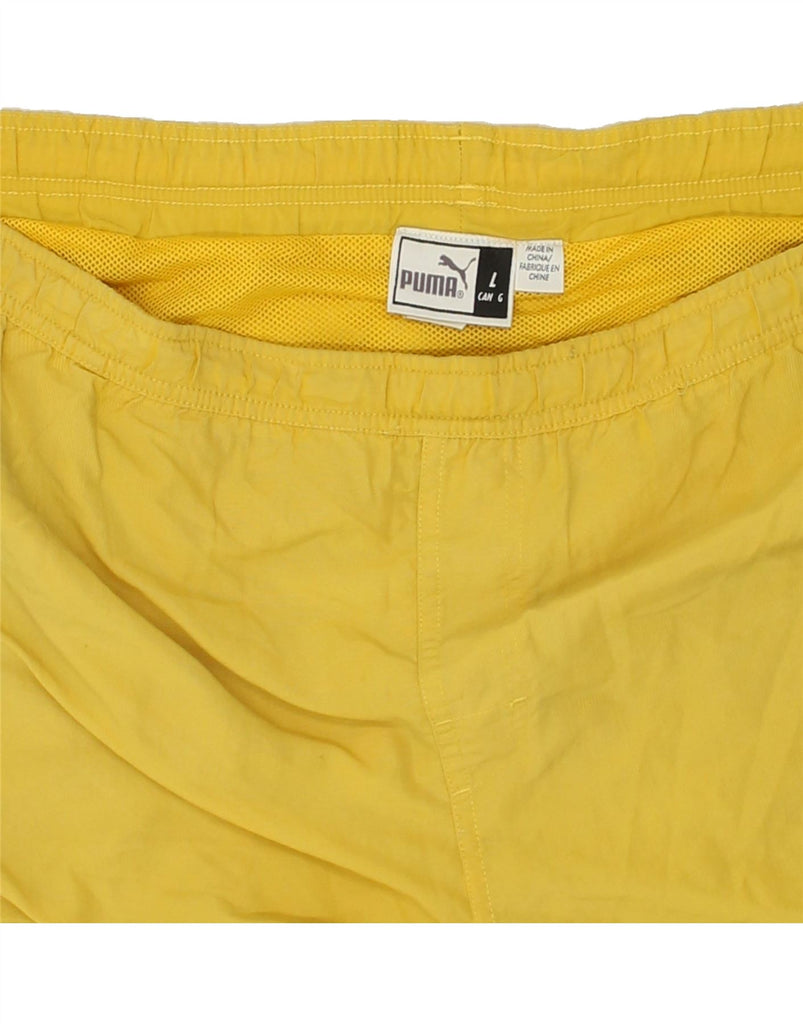 PUMA Mens Graphic Sport Shorts Large Yellow Colourblock Nylon | Vintage Puma | Thrift | Second-Hand Puma | Used Clothing | Messina Hembry 