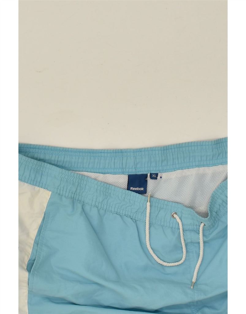 REEBOK Mens Graphic Swimming Shorts XL Blue Colourblock | Vintage Reebok | Thrift | Second-Hand Reebok | Used Clothing | Messina Hembry 