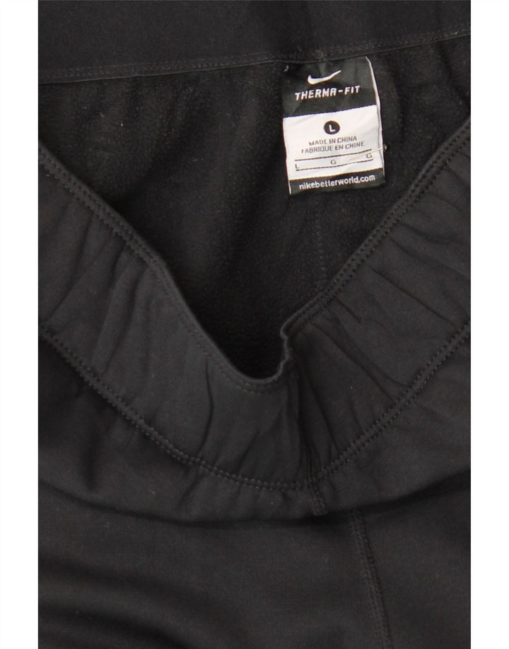 NIKE Womens Therma-Fit Tracksuit Trousers UK 14 Large  Black Polyester Vintage Nike and Second-Hand Nike from Messina Hembry 