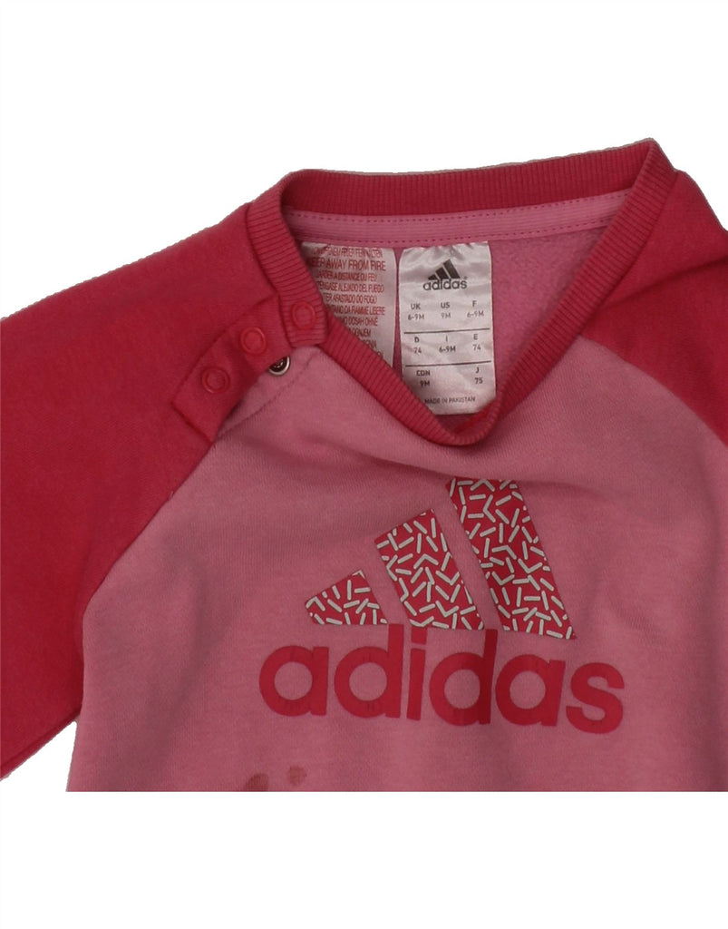 ADIDAS Baby Girls Graphic Sweatshirt Jumper 6-9 Months Pink Colourblock Vintage Adidas and Second-Hand Adidas from Messina Hembry 