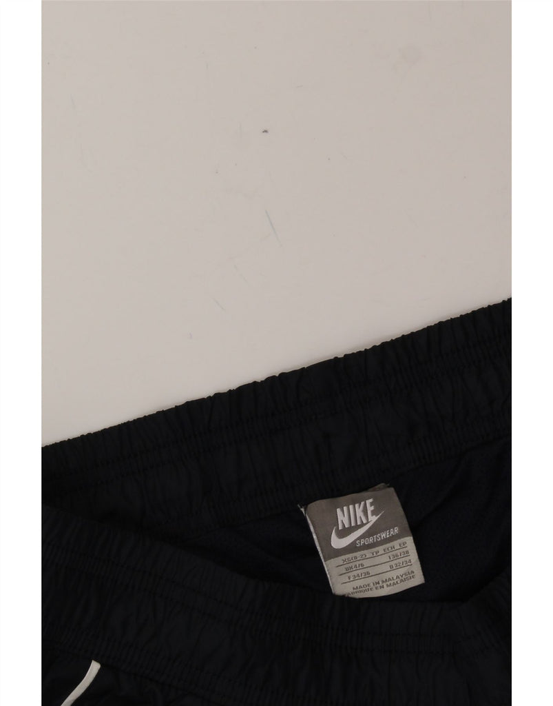 NIKE Womens Tracksuit Trousers UK 4/6 XS Navy Blue Vintage Nike and Second-Hand Nike from Messina Hembry 