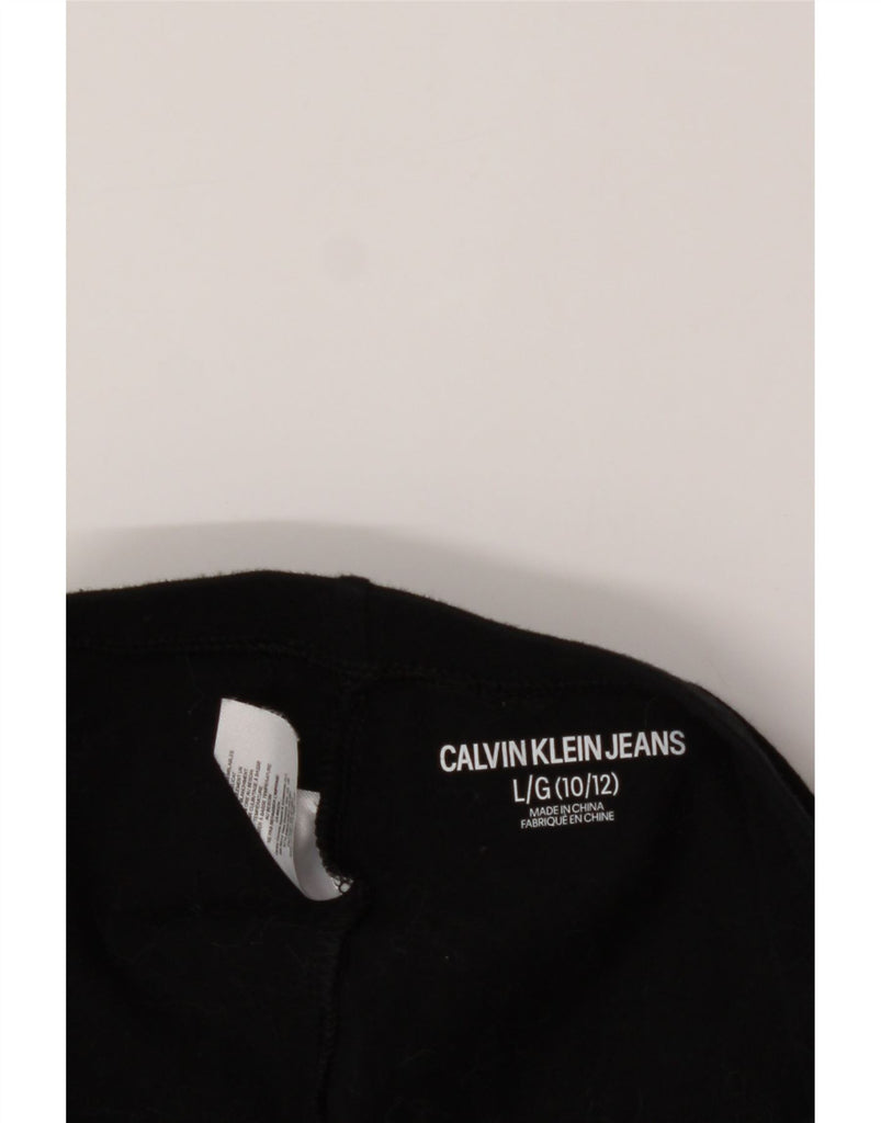 CALVIN KLEIN Girls Graphic Leggings 10-11 Years Large Black Cotton Vintage Calvin Klein and Second-Hand Calvin Klein from Messina Hembry 