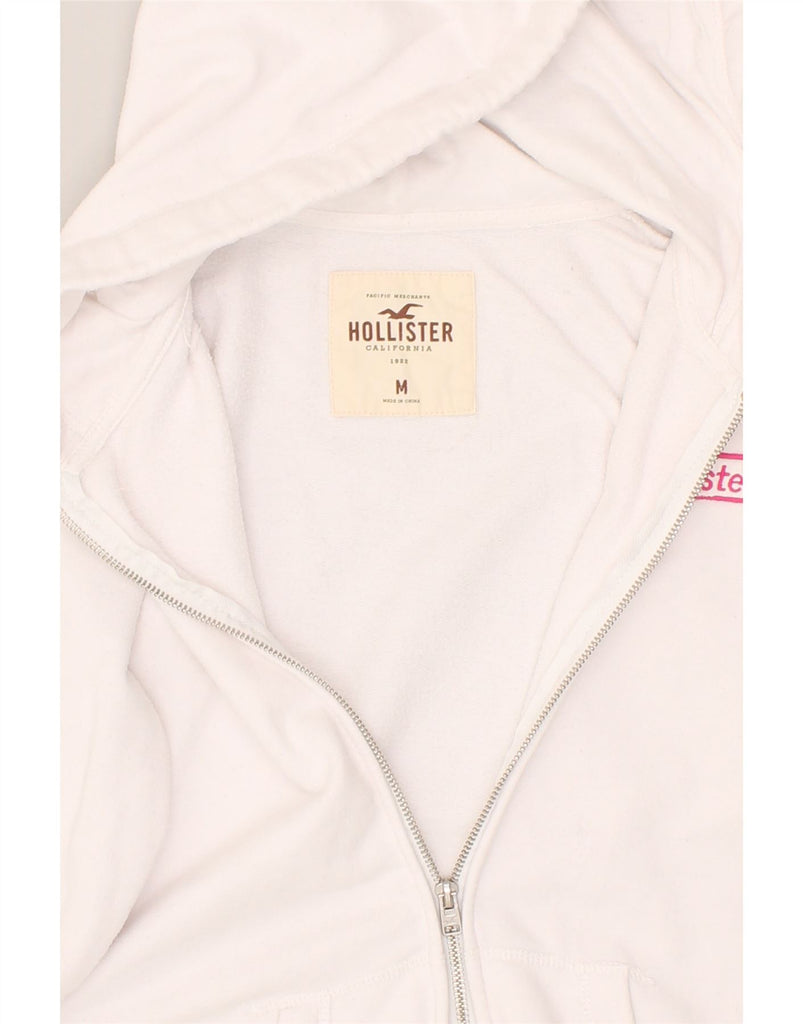 HOLLISTER Womens Graphic Zip Hoodie Sweater UK 14 Medium White Cotton | Vintage Hollister | Thrift | Second-Hand Hollister | Used Clothing | Messina Hembry 