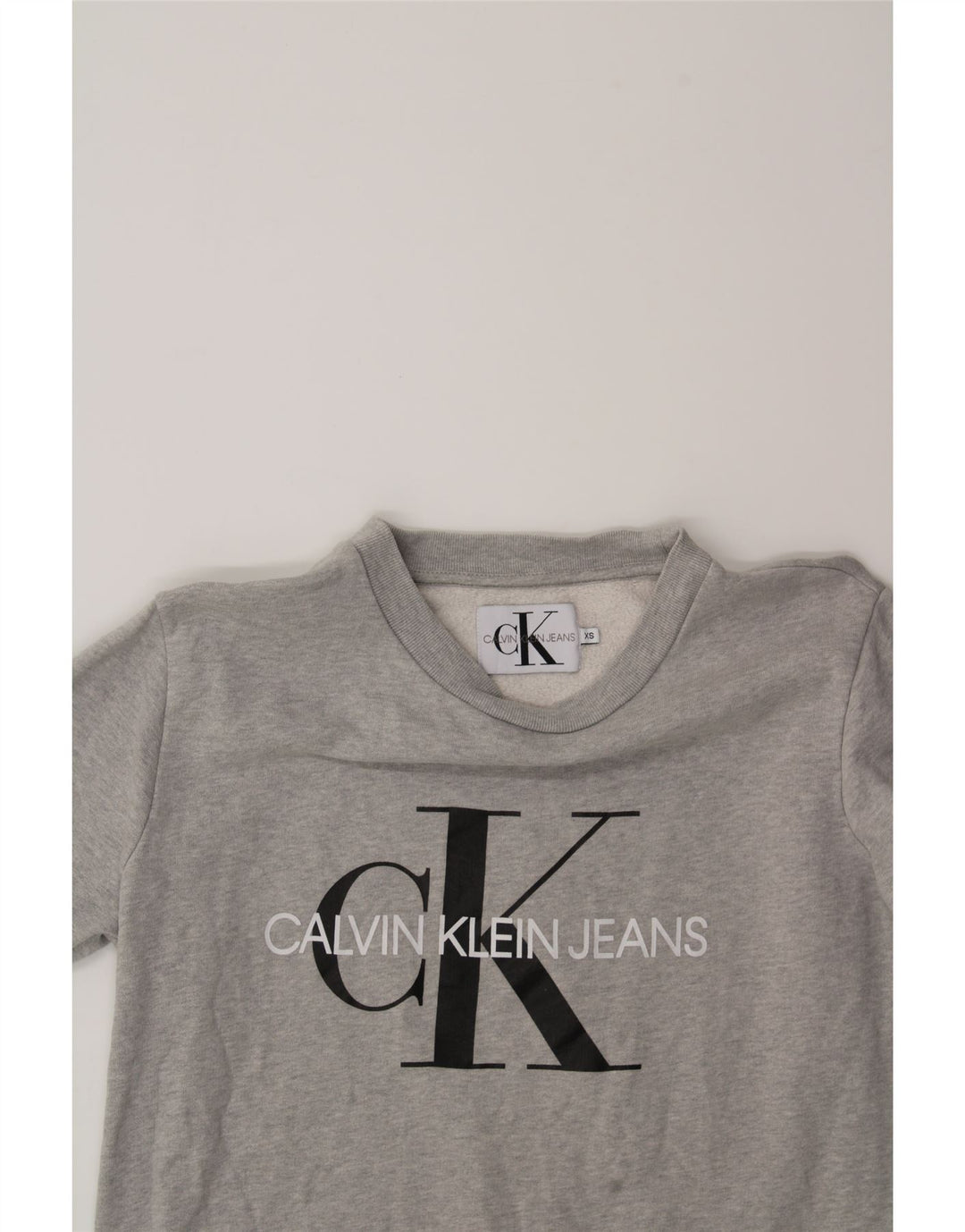 CALVIN KLEIN JEANS Mens Graphic Sweatshirt Jumper XS Grey Cotton Vintage Calvin Klein Jeans and Second-Hand Calvin Klein Jeans from Messina Hembry 