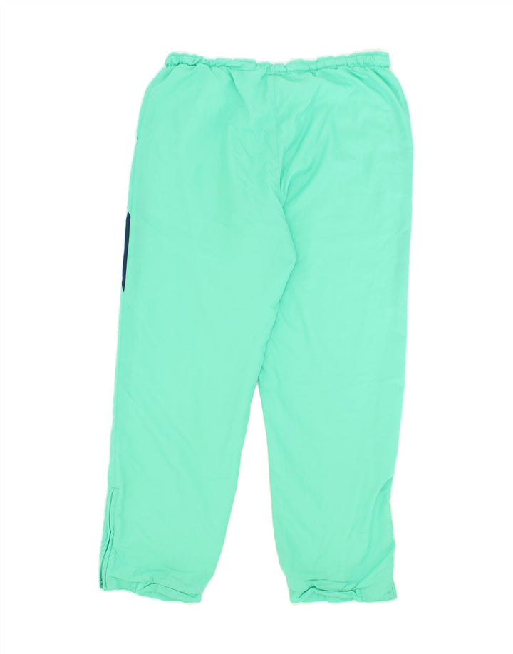 ELLESSE Mens Tracksuit Trousers Large Turquoise Colourblock Polyester Vintage Ellesse and Second-Hand Ellesse from Messina Hembry 