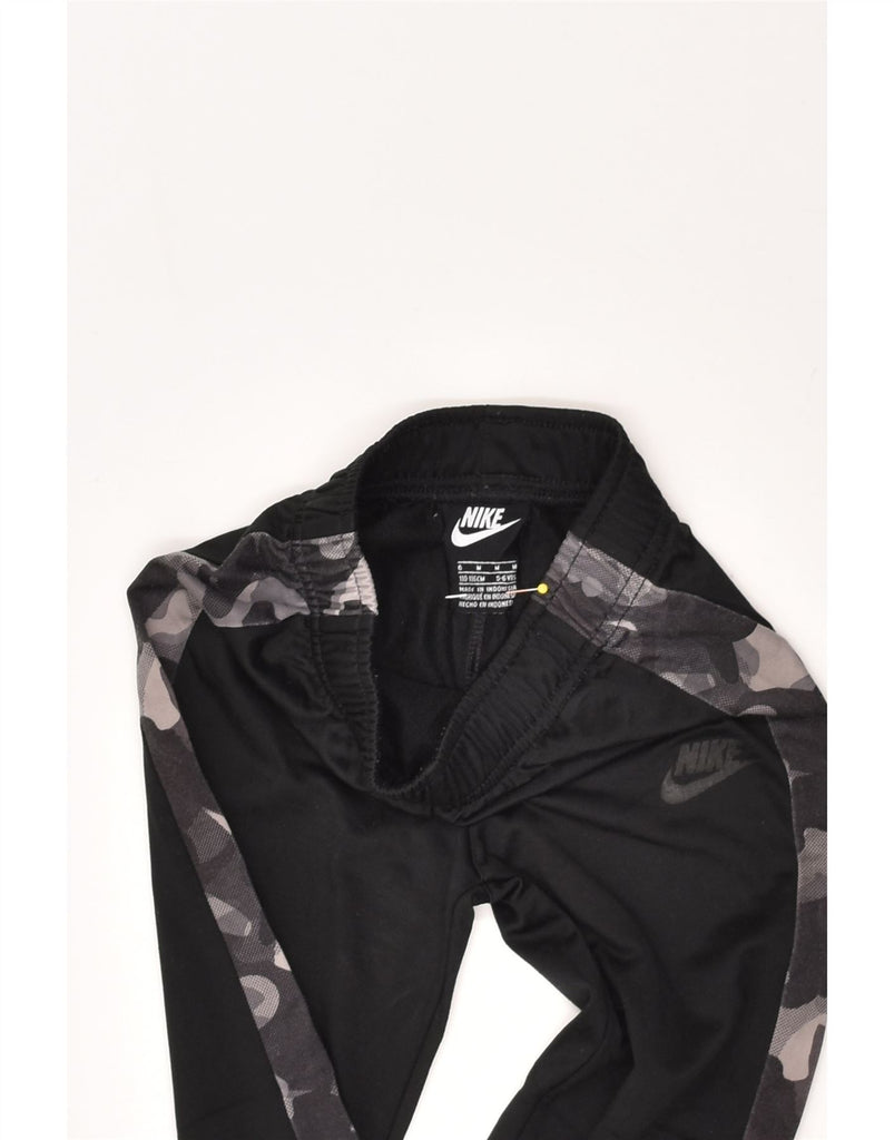 NIKE Boys Graphic Tracksuit Trousers Joggers 5-6 Years Medium Black | Vintage Nike | Thrift | Second-Hand Nike | Used Clothing | Messina Hembry 