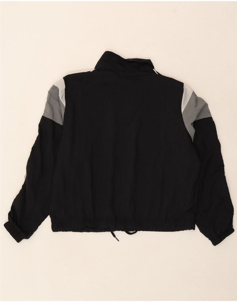 NIKE Womens Oversized Pullover Tracksuit Top UK 6 XS Black Colourblock Vintage Nike and Second-Hand Nike from Messina Hembry 