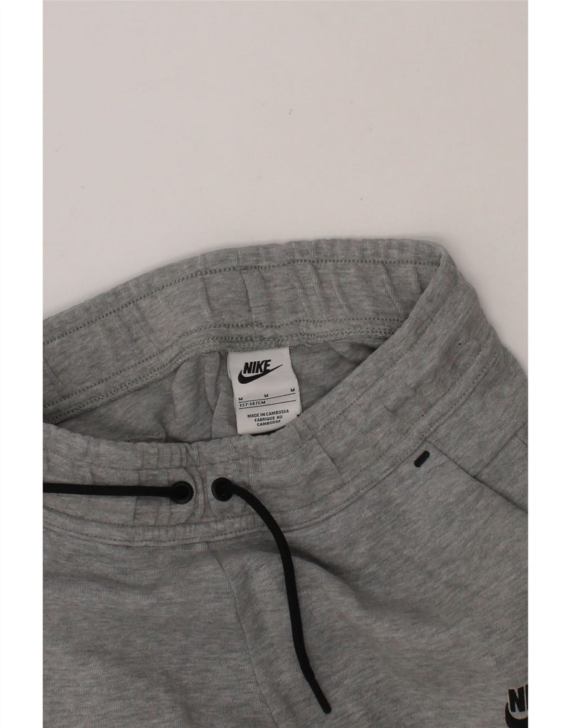 NIKE Boys Tracksuit Trousers Joggers 10-11 Years Medium Grey Cotton Vintage Nike and Second-Hand Nike from Messina Hembry 