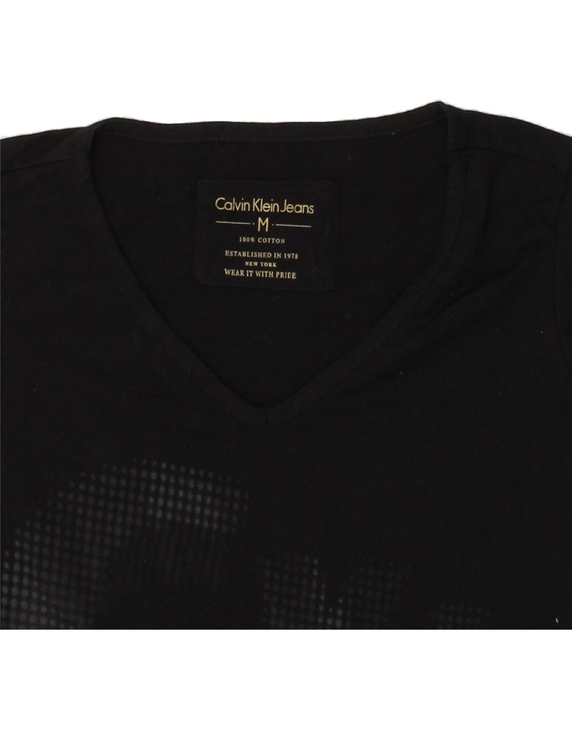 CALVIN KLEIN JEANS Womens Graphic T-Shirt Top UK 12 Medium Black Cotton Vintage Calvin Klein Jeans and Second-Hand Calvin Klein Jeans from Messina Hembry 